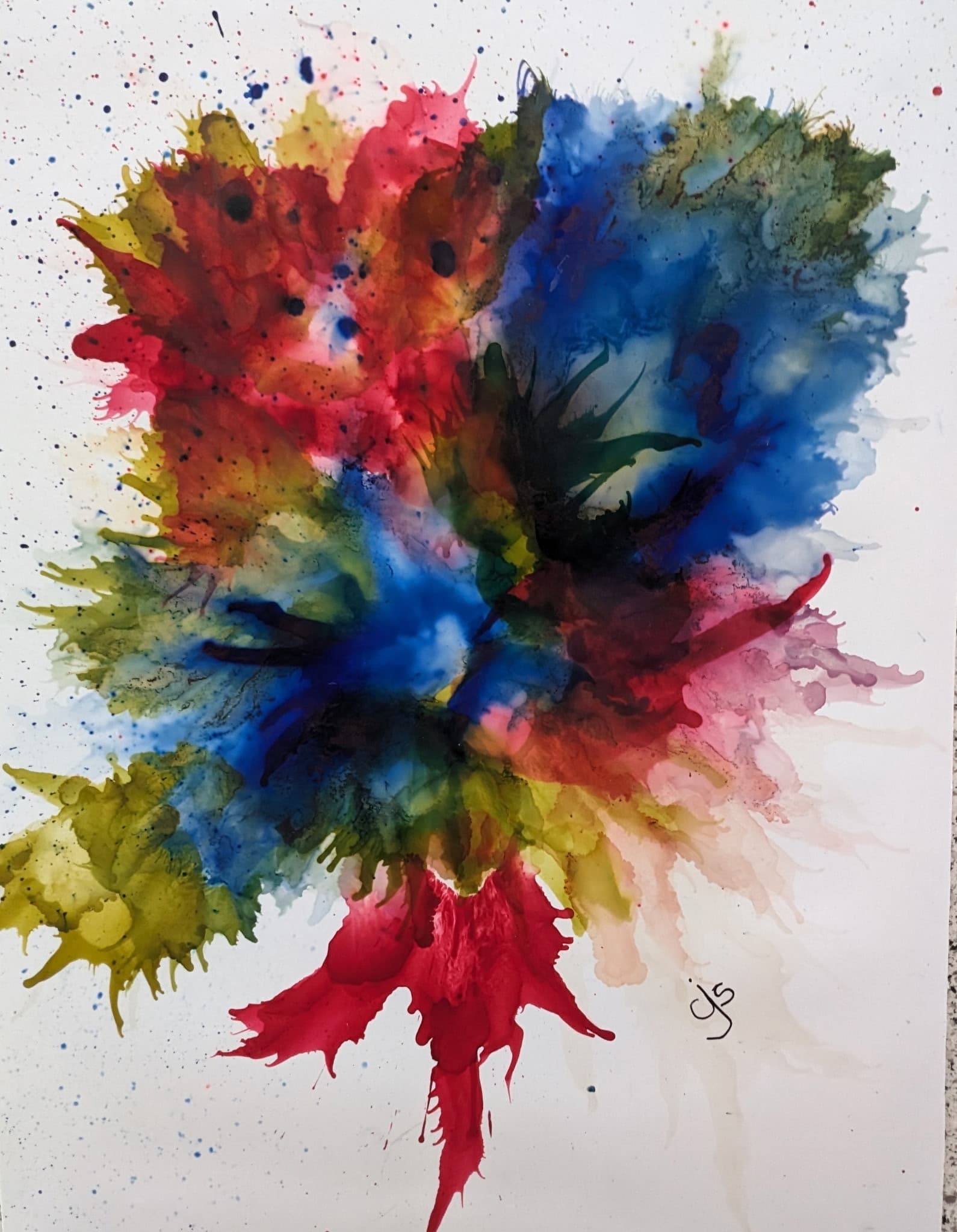 Multicolor ink explosion on white